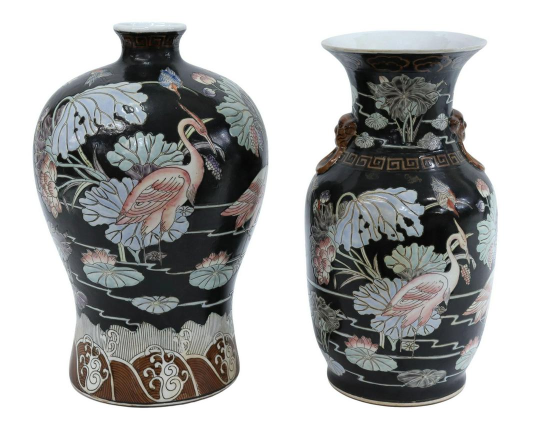 (2) CHINESE FAMILLE NOIR ENAMELED PORCELAIN VASES: (lot of 2) Chinese famille noir enameled porcelain vases, decorated with water birds and foliates on black ground, bearing red honorific mark underfoot, comprising: (1) baluster form, with foo lion he