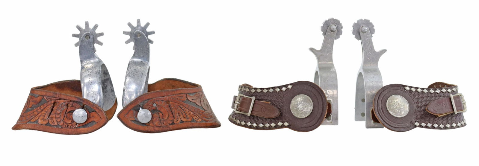 (2 PAIR) CROCKETT RENALDE & OTHER COWBOY SPURS: (lot of 2 pairs) Cowboy Spurs, aluminum, including: (1) marked at the swing arm CR for Crockett Renalde, 9 point 1.25" rowels, foliate etching at outside heelband, tooled concho leathers by Shanks Bro