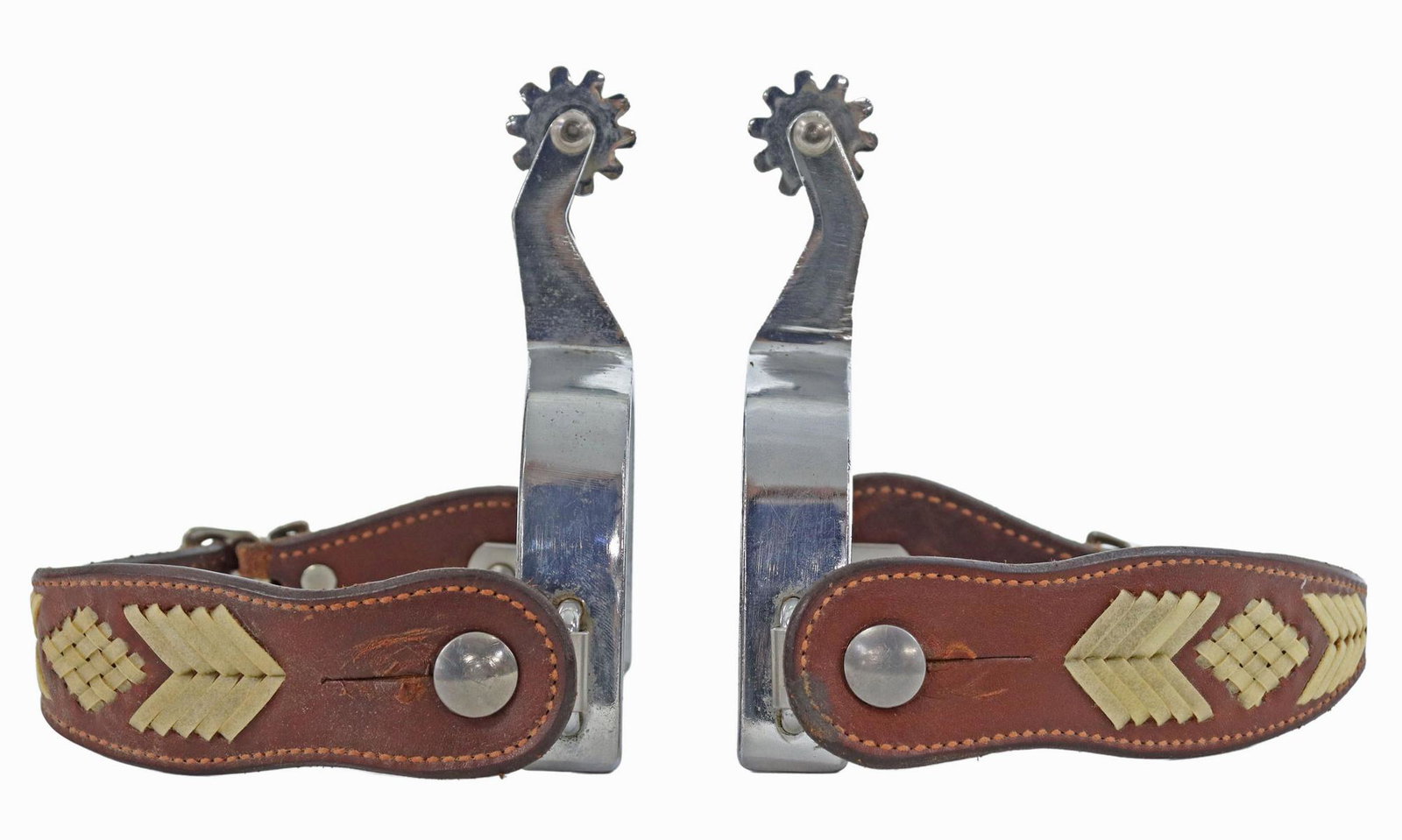 (PAIR) CROCKETT RENALDE COWBOY SPURS: (pair) Crockett Renalde cowboy spurs, CR marked at the swing arm, 10 point 1" rowels, tooled buckle leathers, yoke: approx 3.5"w, 3"d Start Price: $80.00