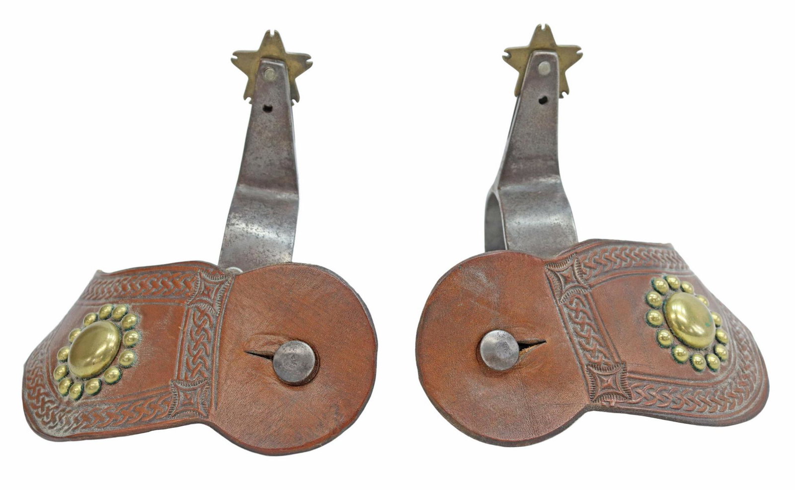 (PAIR) BOB BLACKWOOD COWBOY BULL RIDING SPURS: (pair) Cowboy bull riding spurs, each stamped "BB" for Bob Blackwood, 1 1/8" five-point star rowels, leathers by John Clark, Shakopee, Minnesota, yoke: approx 3 7/8"w, 3"d **Note: Bob Blackwood, Texas
