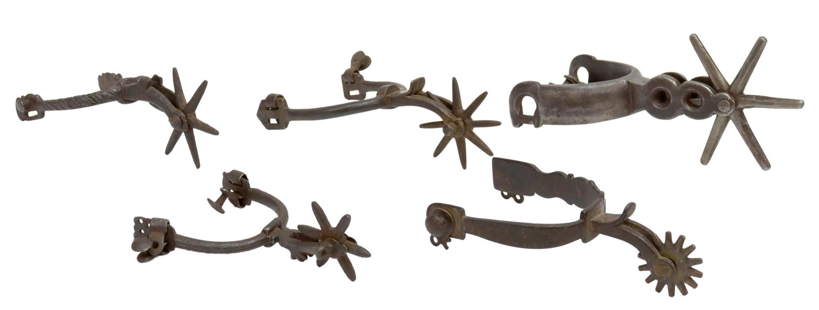 (5) ANTIQUE SINGLE COWBOY SPURS FOR DISPLAY: (lot of 5) Antique single spurs, including: (1) nickel accented with six point 4" rowel; (1) with eight point 2.5" rowel; (1) rope edge yoke, six point 2.75" rowel; (1) rope edge, six point 2" rowel; 
