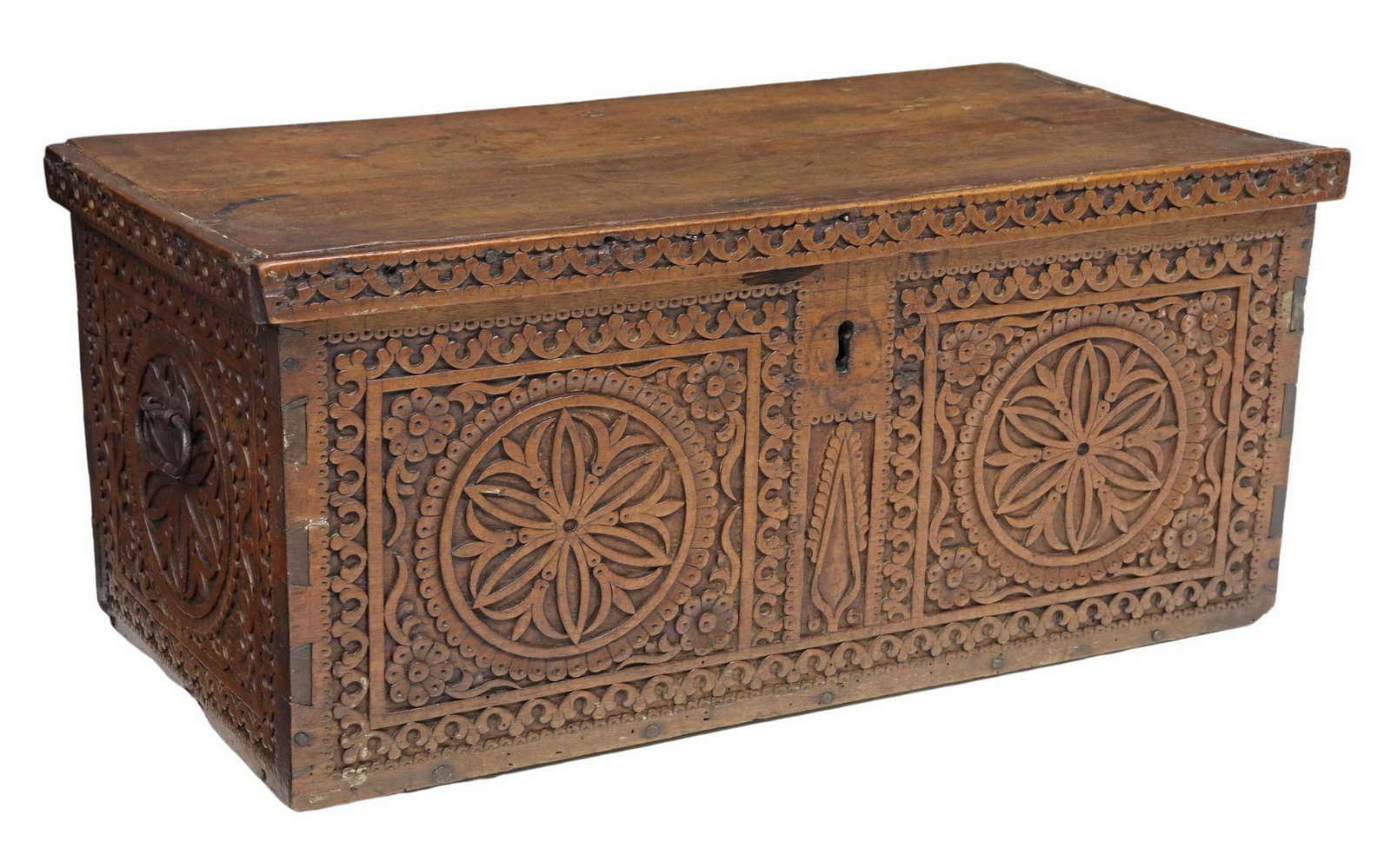 BAROQUE STYLE CARVED WALNUT COFFER TRUNK: Baroque style walnut coffer/ storage trunk, 18th/ 19th c., richly carved with geometric floral design, having hinged top, opening to sectioned interior, fitted with iron handles, intact with crack to 