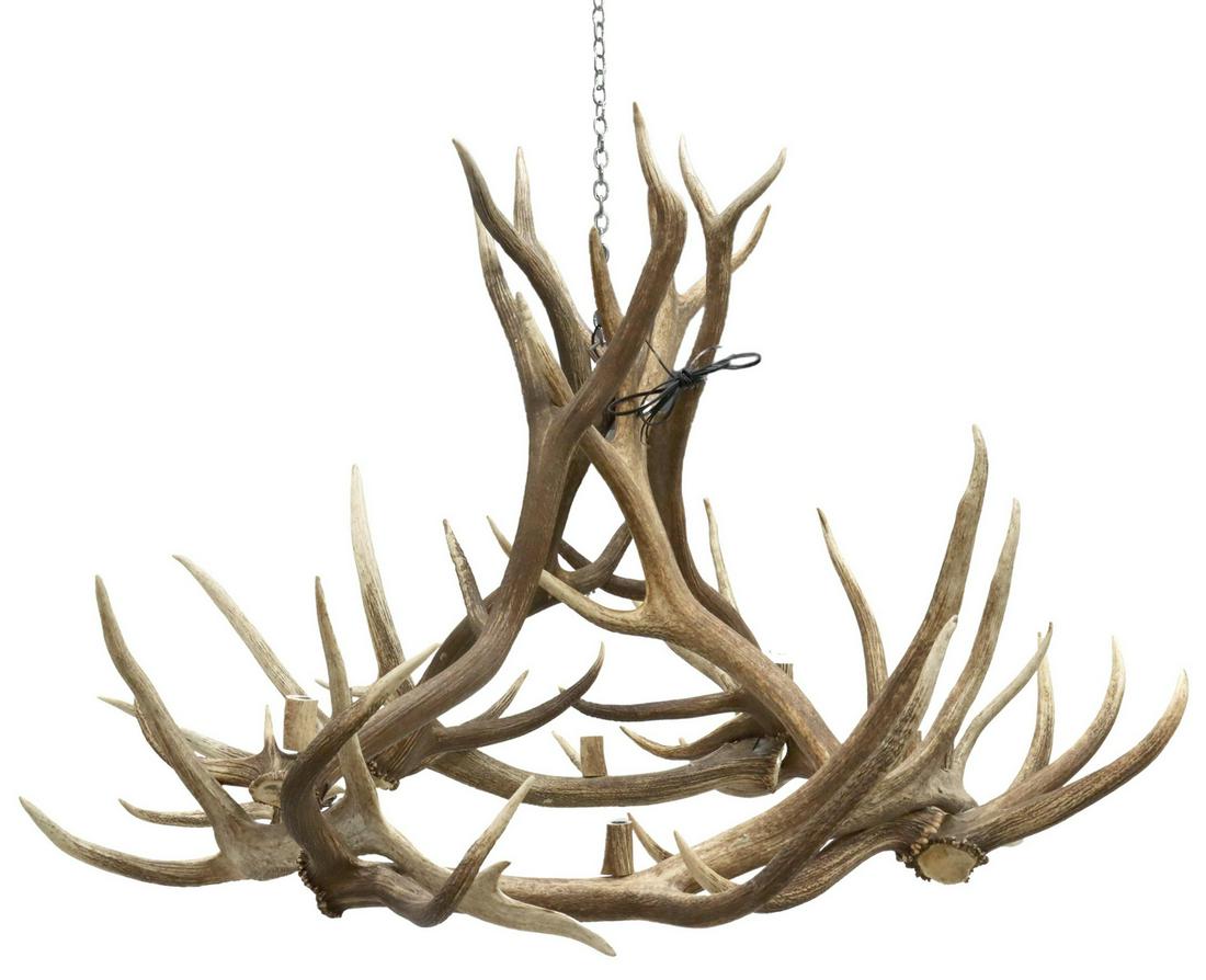 LARGE ELK ANTLER EIGHT-LIGHT CHANDELIER, 59"L: Large Elk antler eight-light chandelier, approx 40"h, 59"l, 60"w *Provenance: A private Texas museum.* Start Price: $500.00