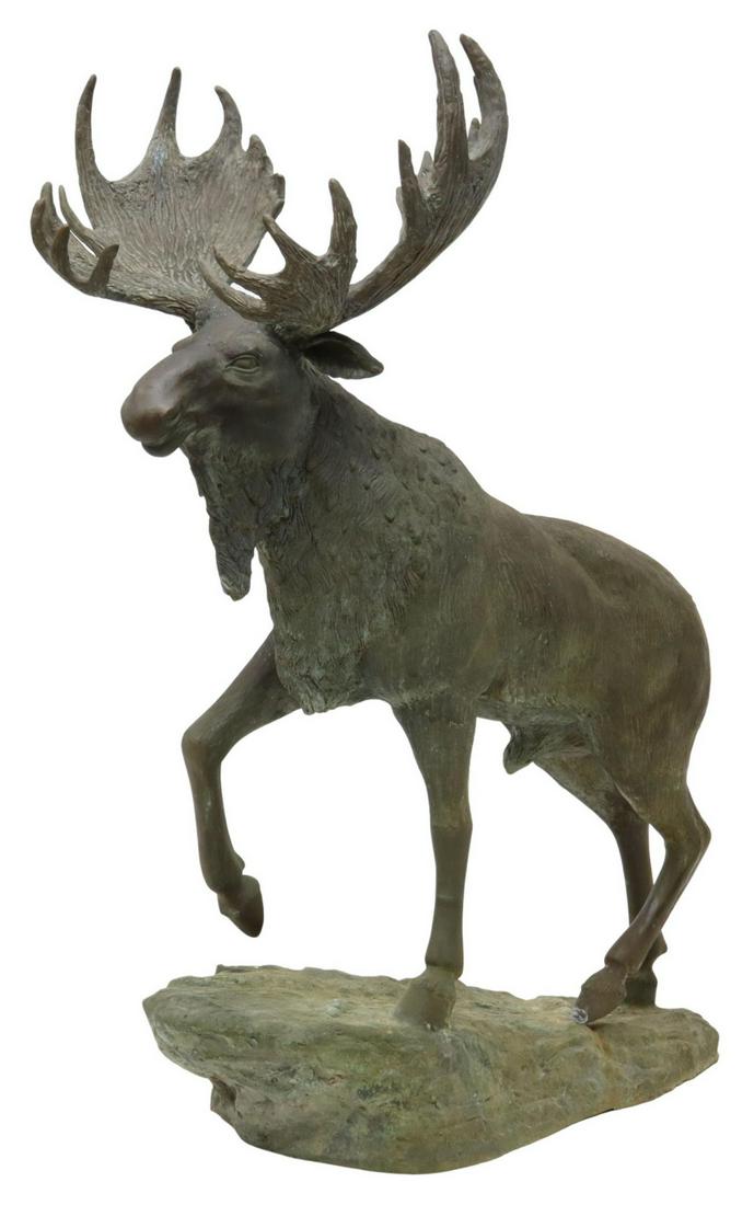 LARGE PATINATED BRONZE MOOSE GARDEN SCULPTURE: Patinated bronze garden sculpture, moose standing on rocky outcropping, evidence of outdoor use, approx 61"h Start Price: $600.00