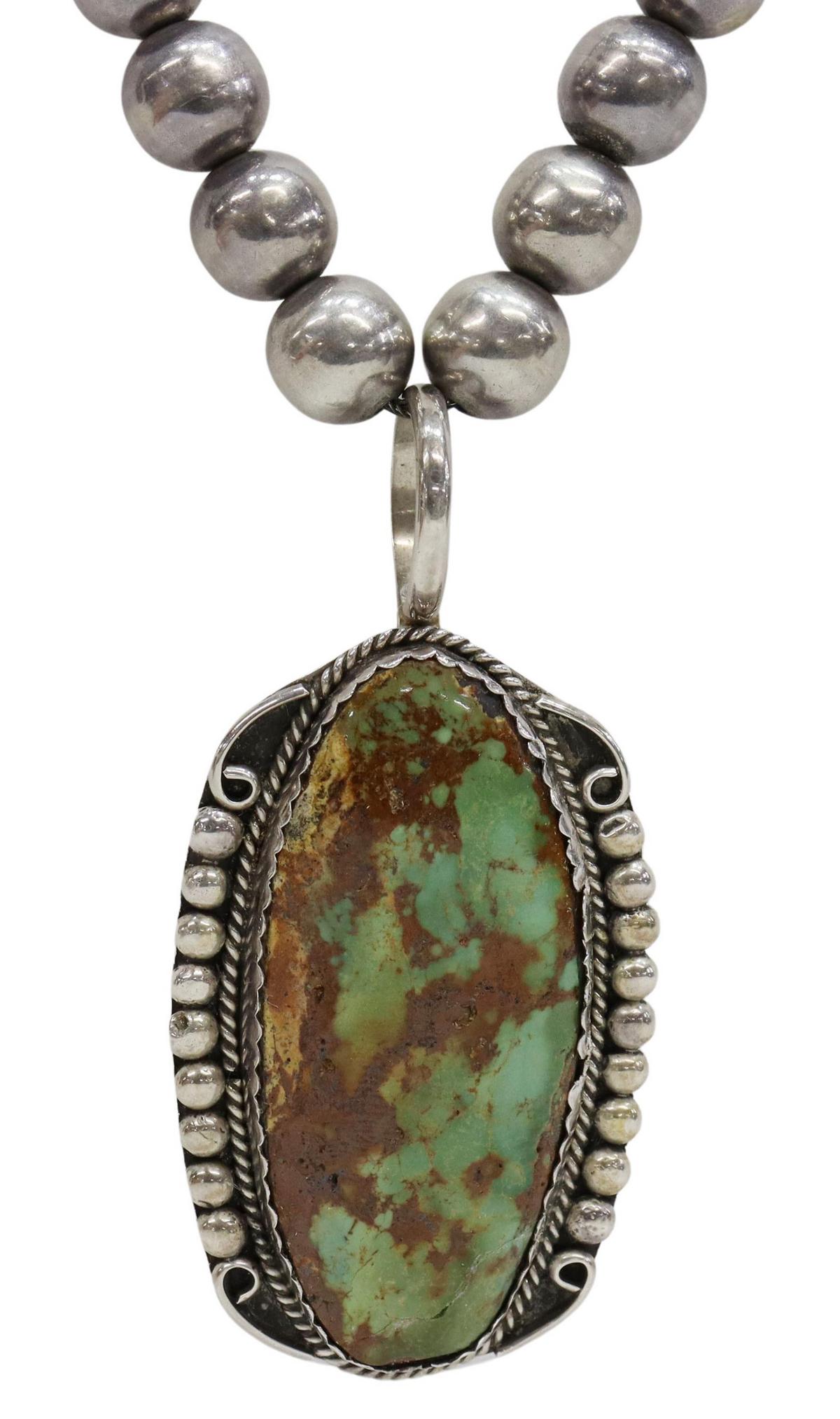 SILVER BEADED NECKLACE W/ TURQUOISE PENDANT: Native American silver (content unknown) pendant, with large bezel-set turquoise cabochon, unmarked, on a Mexican silver beaded necklace, clasp marked TD-29 Mexico, hairline to turquoise, loss to (one