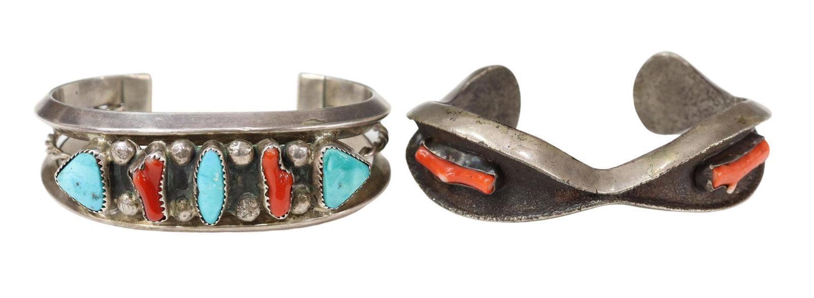 2) NATIVE AMERICAN SILVER, CORAL & TURQUOISE CUFFS: (lot of 2) Native American silver (content unknown) cuff bracelets: (1) having two prong cuff with central twisted wire, bezel set turquoise and red coral branches on the front spaced by beads, etched