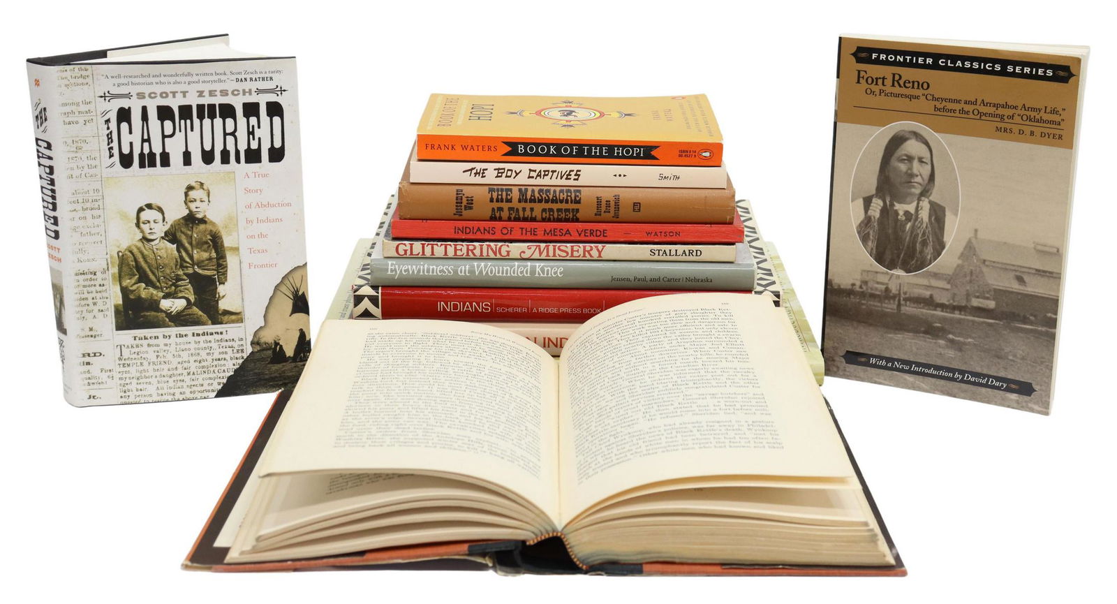 (12) BOOKS: NATIVE AMERICAN PHOTO SUBJECTS: (lot of 12) Books: Native American subjects, including: (1) "Eyewitness at Wounded Knee," many photos before and after battle; (1) "On the Trail to Wounded Knee," Guy Le Querrec; (1) "Bury My Heart at