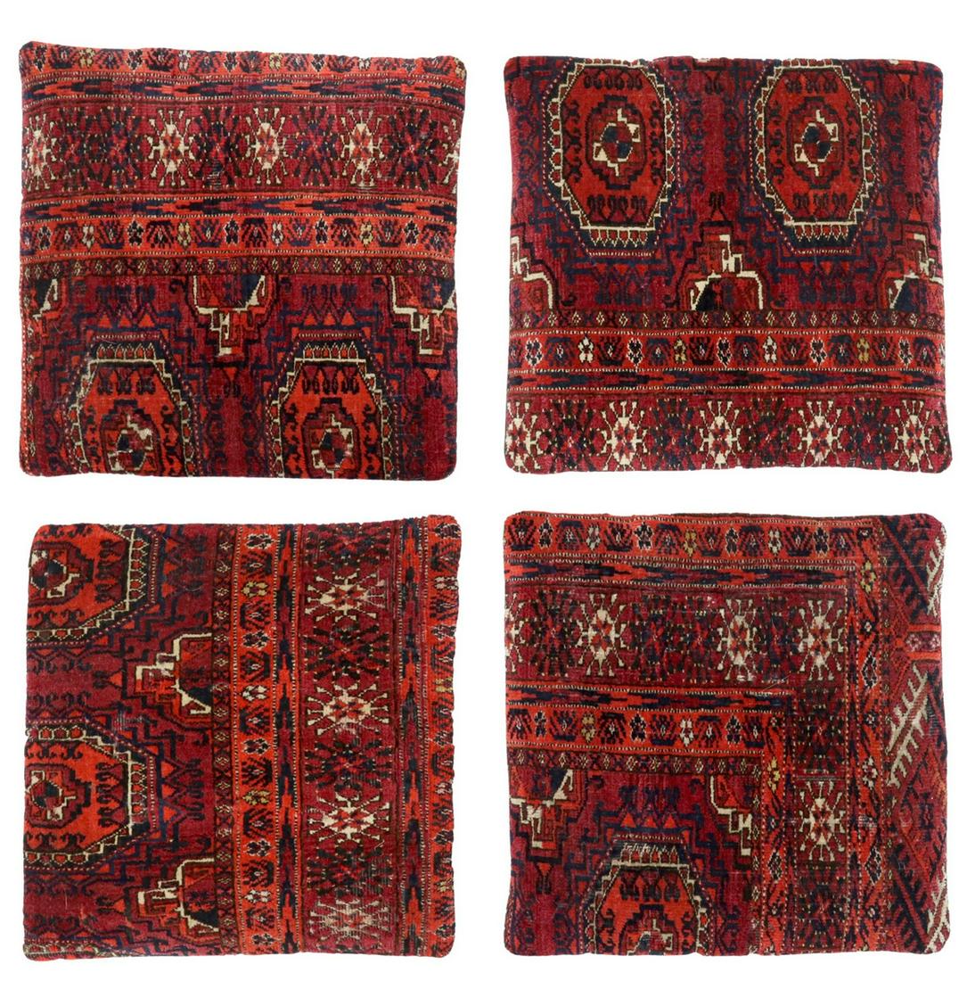 (4) DECORATIVE TURKMEN WOOL RUG THROW PILLOWS: (lot of 4) Decorative throw pillows, fashioned from hand-woven Turkmen wool rugs, with black cotton backing, made in Turkey, approx 15"h, 16"w; 9lbs total Start Price: $80.00