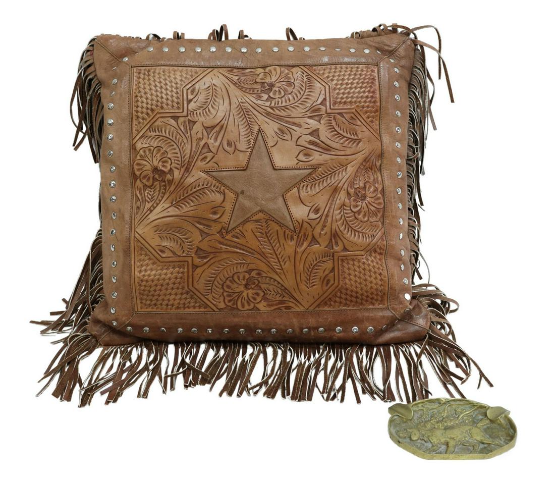 (2) WESTERN LEATHER FRINGE PILLOW & BRASS ASHTRAY: (lot of 2) Western related items, including: (1) brass cigar ashtray, depicting a hunting dog, approx 3.75"h, 5 3/8"w; (1) tooled leather and cloth pillow with foliate and star design, silver-tone stu