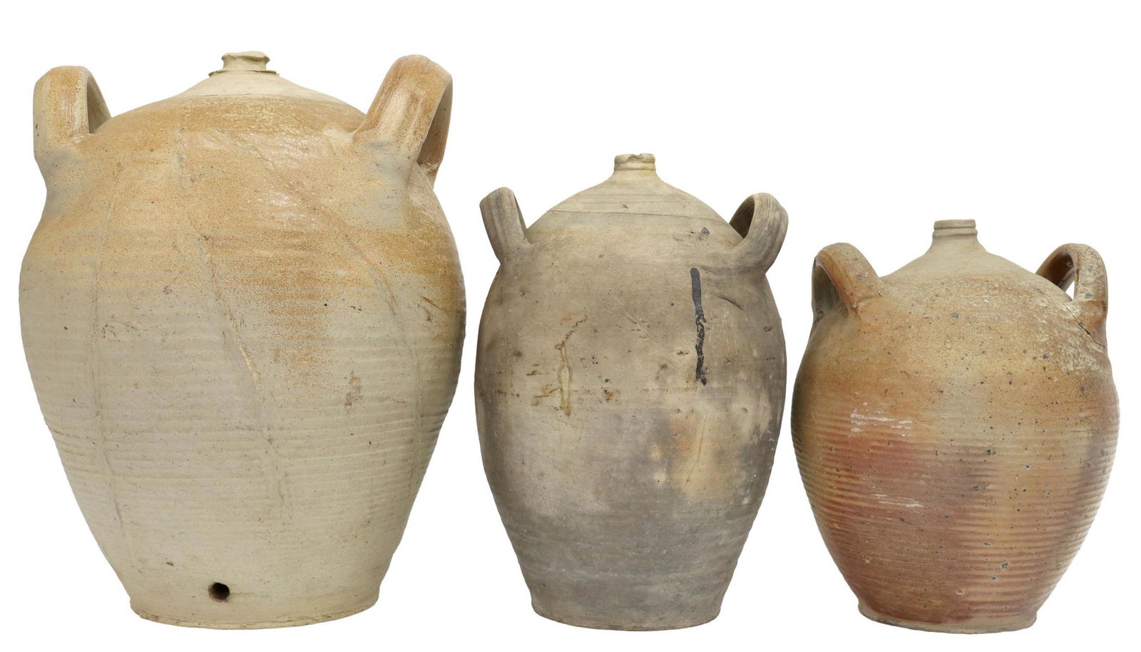 (3) FRENCH PROVINCIAL EARTHENWARE OIL JUGS: (lot of 3) French provincial earthenware oil jugs, each having dual side handles, small mouths, over wheel turned tapered bodies, largest: approx 16.75"h, 12.75"w, 11"d; 35lbs total Start Price: $150.