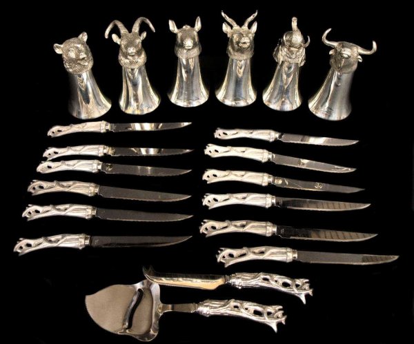 ALUMINUM STAG ANLTER KNIVES & ANIMAL FORM GOBLETS: (lot of 20) Stag and other animal form tableware, likely Arthur Court, comprising: (12) stag antler form steak knives, 9"l; a (2) piece cheese service in same stag antler pattern, each 9"l; (6) cups, 