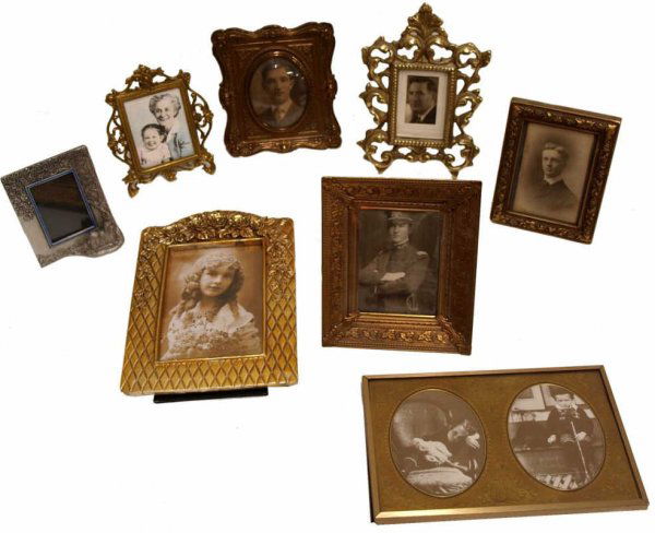 ANTIQUE & MODERN PICTURE FRAMES, OLD PHOTOS: (lot of 8) Antique and modern dresser frames, some retaining old photos, comprising: (1) embossed metal frame with domed glass, 6.75"h, 5"w; (1) gilt iron Rococo styled frame, 7.5"h, 5"w; (1) cast in