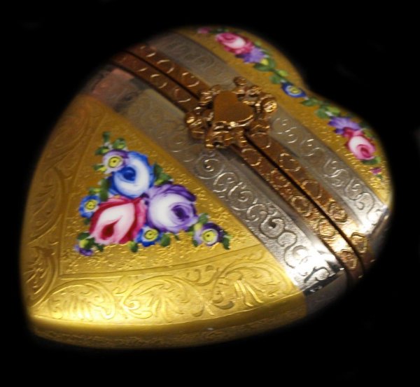 LIMITED LIMOGES HEART FORM PERFUME, HEAVILY GILDED: Limoges, France porcelain heart form perfume box, the whole elaborately gilt and hand painted, opening to reveal gilt capped perfume vial, hand numbered at interior 52/2000 with painter's initials, 2.