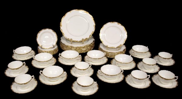 (56) ENGLISH PORCELAIN COALPORT DINNER SERVICE: (lot of 56) English porcelain dinner service for eight by Coalport, in the 'Admiral' pattern, white with heavily gilded trim, comprising: (8) dinner plates, 10.5"d; (8) salad plates, 7.75"d; (8) bread