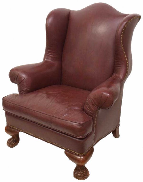 HICKORY CHAIR LEATHER PAW FOOT WINGBACK CHAIR: "Hickory Chair Leather" wingback chair raised on carved paw feet (front), the oversized chair with contoured design, upholstered in burgundy leather with brass tack accents and loose cushion seat, 45"