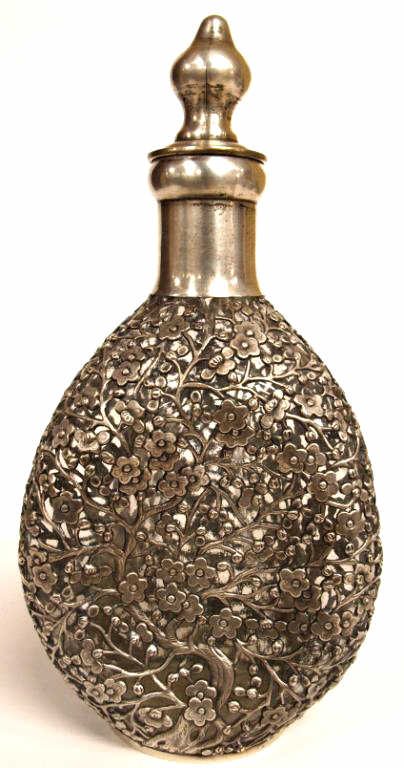 "SOLID SILVER" OVERLAY CHERRY BLOSSOM DECANTER: "Tai Ping", pinched glass decanter having 'solid silver' overlay decoration in a blossom motif, base stamped with makers name and 'solid silver", 10"h, 5"w, 5"d, 1.75lbs (23A)