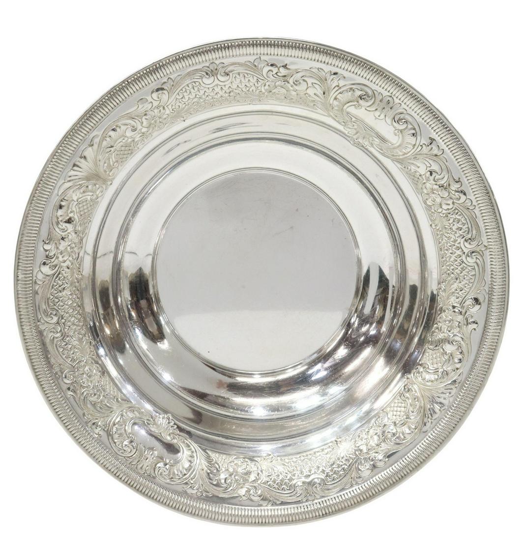 ELLMORE 'VICTORIA' STERLING CENTERPIECE BOWL: American sterling silver centerpiece/ serving bowl, Ellmore Silver Company, in the "Victoria" pattern, hand-chased rim in the Rococo taste, with reeded edge, scrolling flowers and foliage against a di
