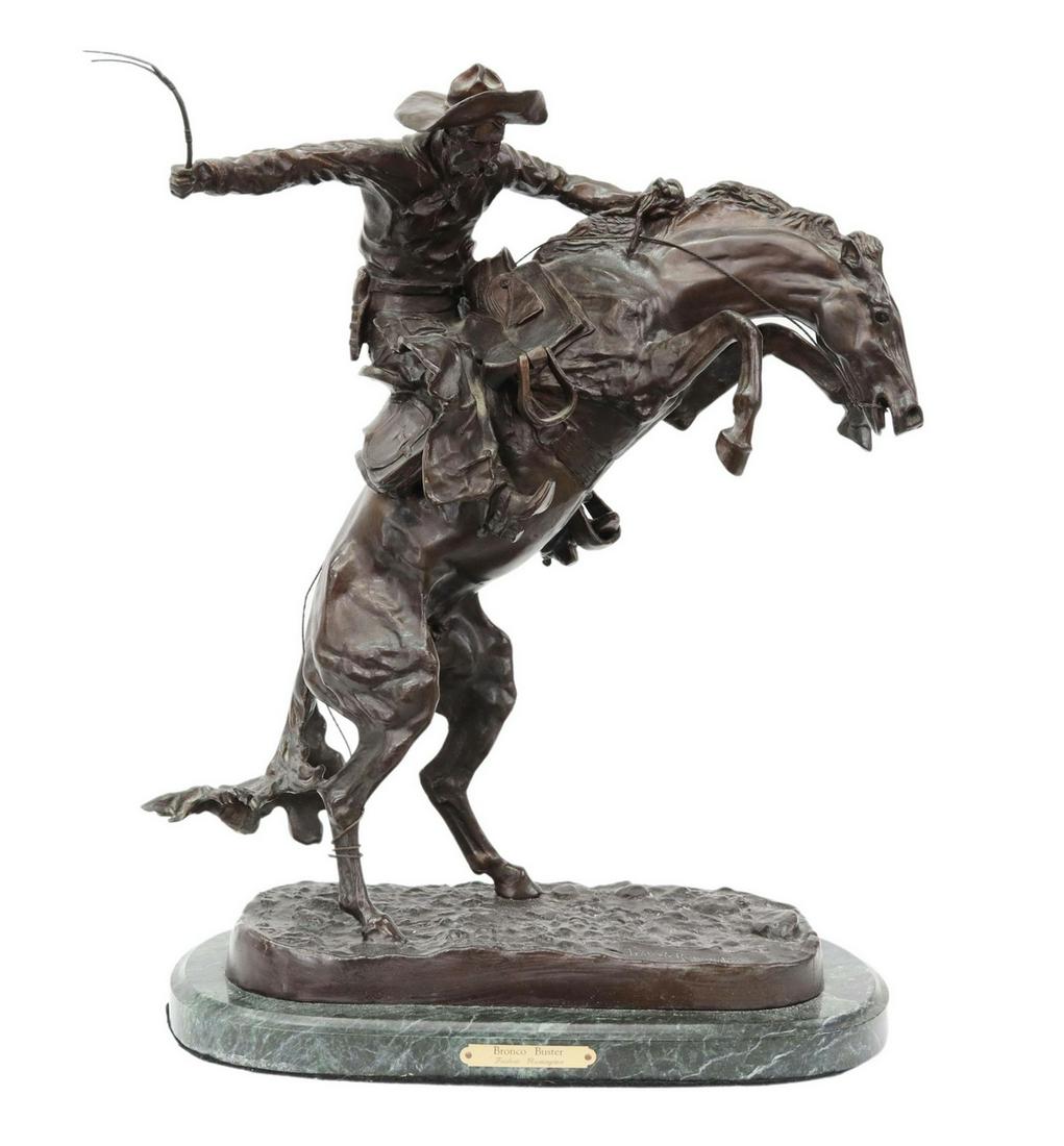 AFTER REMINGTON BRONCO BUSTER BRONZE SCULPTURE: Patinated bronze sculpture, "Bronco Buster," after Frederic Sackrider Remington (American, 1861-1909), on an oval green marble base, overall: approx 22.5"h, 18"w, 9.5"d, 56.5lbs Start Price: $200.00