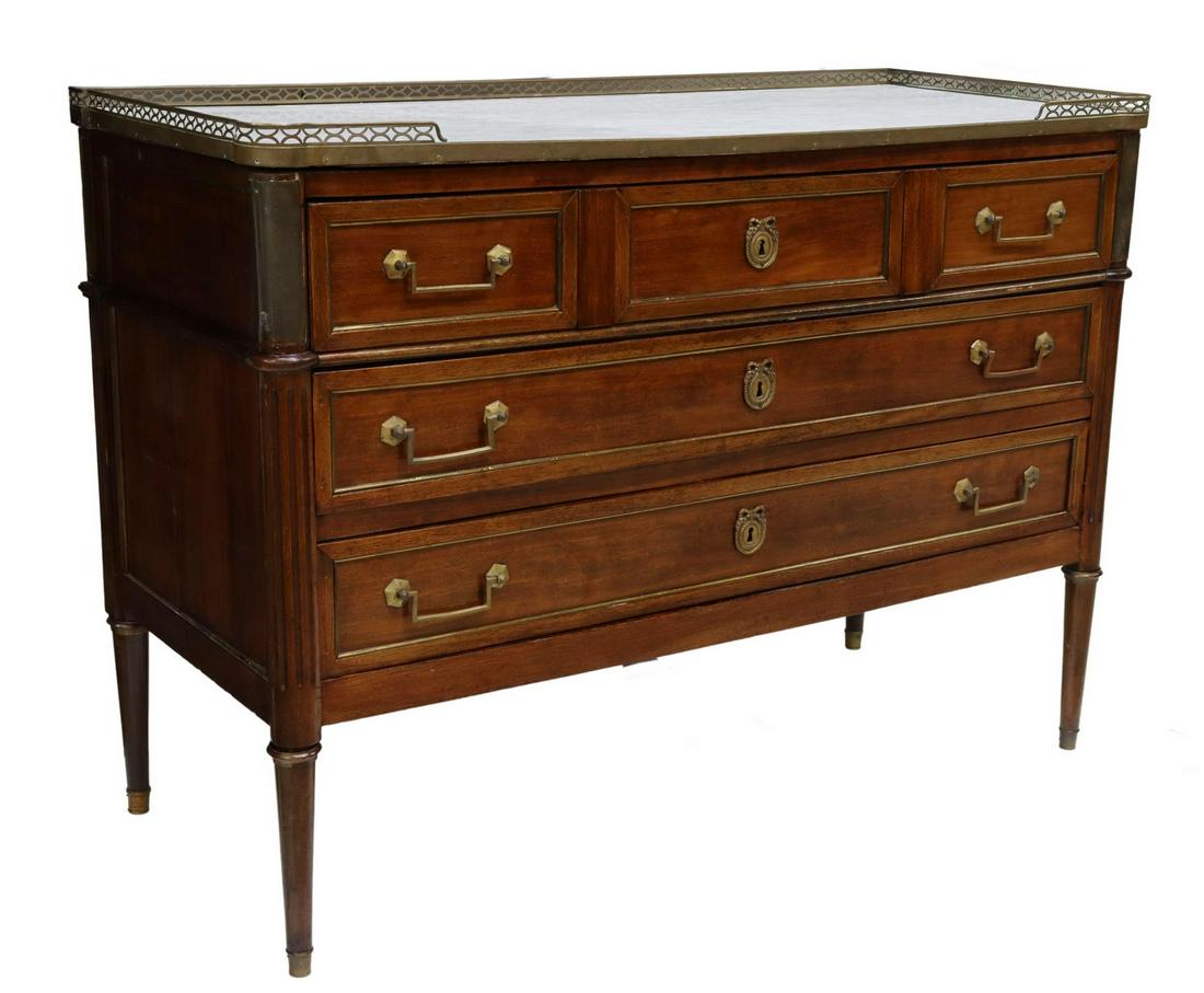 FRENCH LOUIS XVI STYLE MARBLE-TOP MAHOGANY COMMODE: French Louis XVI style marble-top mahogany commode, late 19th c., having pierced gilt metal gallery over inset marble top, case fitted with three drawers, brass trim, fluted corner posts, rising on ta