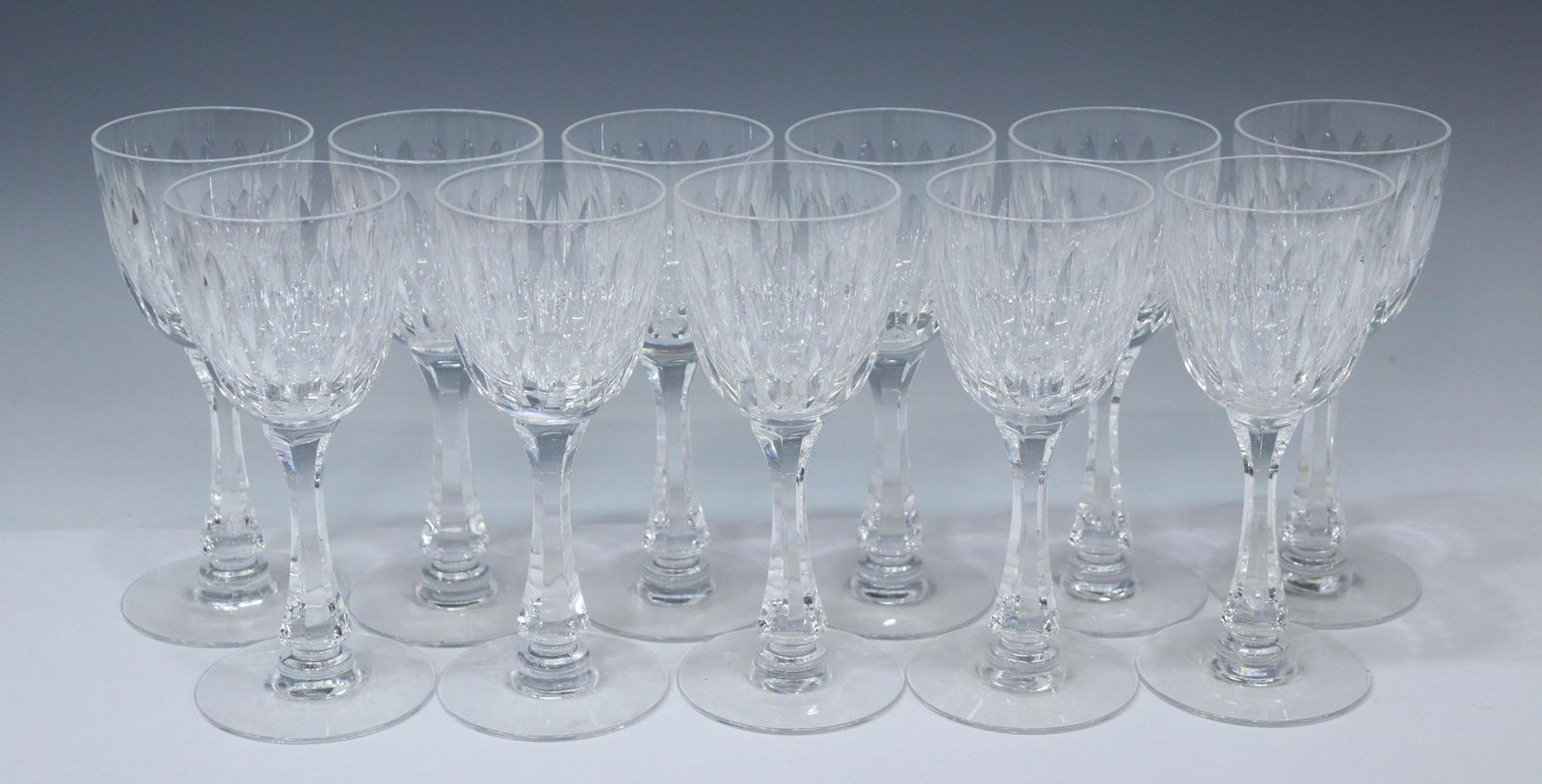 (11) HAWKES 'EARDLEY' CUT CRYSTAL WINE GLASSES: (lot of 11) Hawkes cut crystal wine stems, in the "Eardley" pattern, acid-etched mark to foot, (one) with minute chip to foot, approx 6 5/8"h, 2.75"diam; 6.5lbs total **Provenance: a Houston, Texas es