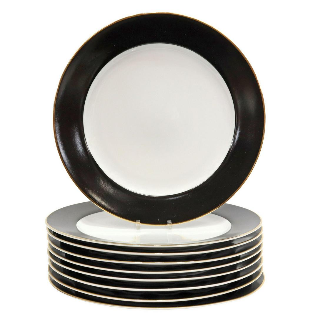 (9) 10 STRAWBERRY STREET 'HALO BLACK' CHARGERS: (lot of 9) Porcelain charger plates, 10 Strawberry Street, in the "Halo Black" pattern, late 20th c., having gilt rim, black border centering white well, approx 12.25"diam; 19.5lbs total Start Price: 