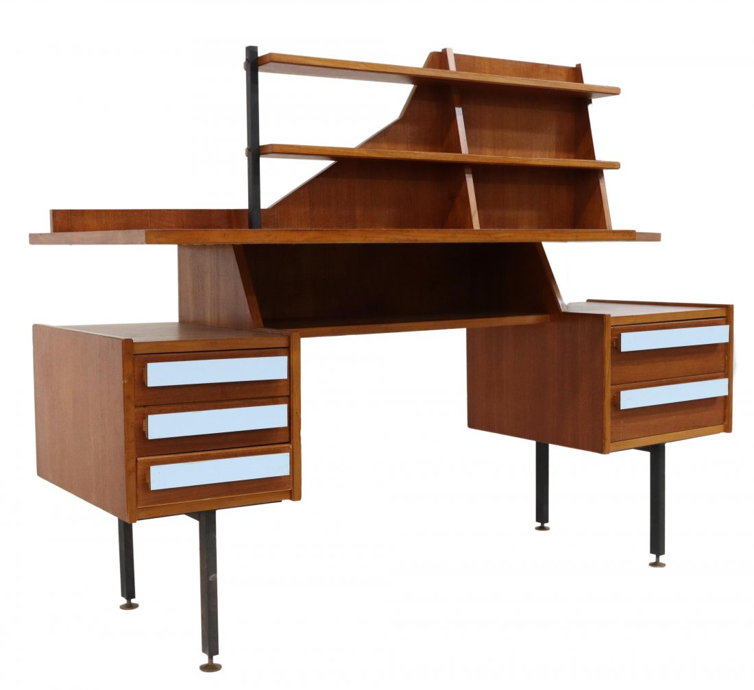 ITALIAN MID-CENTURY MODERN TEAK WRITING DESK: Italian mid-century modern teak writing desk, c.1960s, open shelves surmounting the shaped writing surface, over open niche, five drawers framing the kneehole, with pale, light blue facing, rising on 