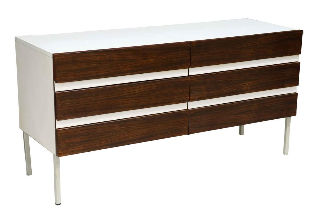 INTERLUBKE MID-CENTURY MODERN LOW DRESSER: German mid-century modern dresser, Interlubke, c.1970s, white laminate case fitted with six rosewood drawers, rising on lacquered steel legs, approx 24"h, 47"w, 16.75"d Start Price: $500.00