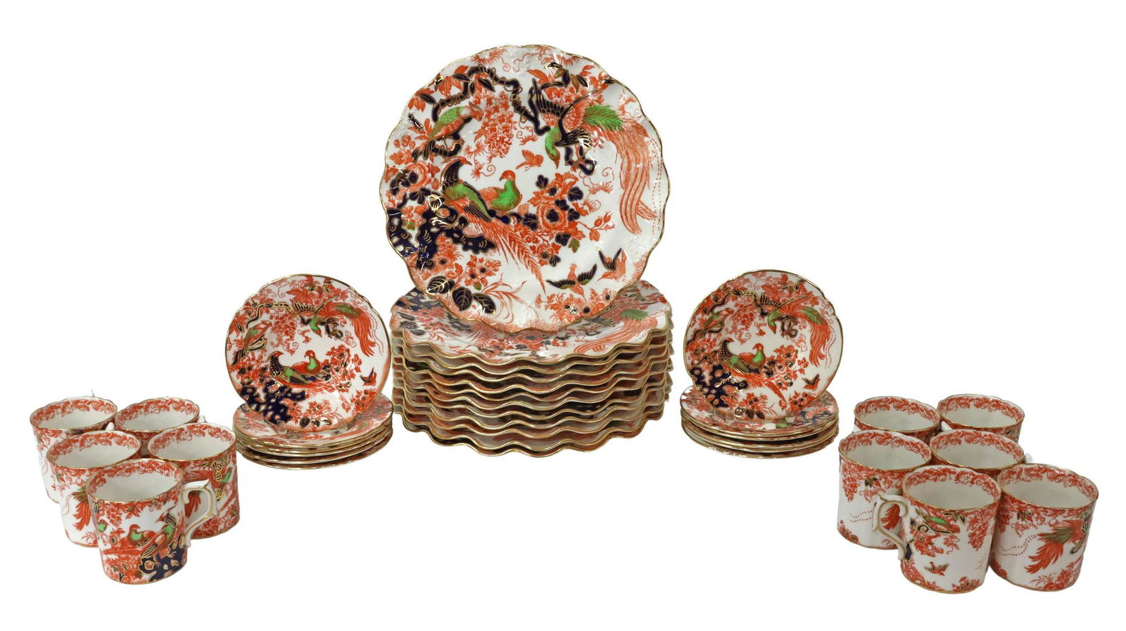 (34) ROYAL CROWN DERBY PARCEL GILT SERVICE: (lot of 34) English parcel gilt bone china partial service, Royal Crown Derby, pattern A549, early 20th c., having gilt rim, with rust, blue, and green foliate and bird motifs, including: (12) luncheo