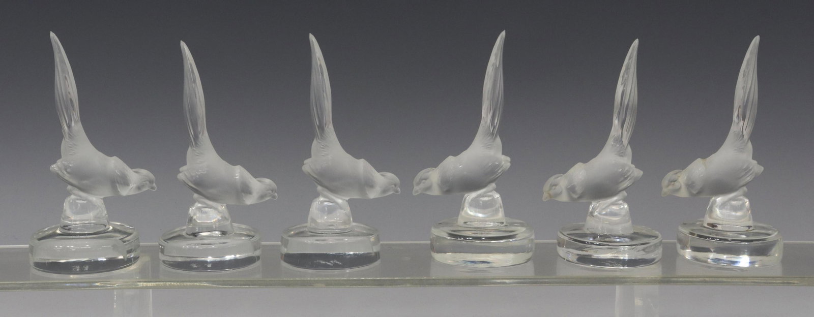 (6) LALIQUE 'FAISAN' FROSTED PLACE CARD HOLDERS: (lot of 6) French Lalique art crystal pheasant form place card holders, with engraved signatures underfoot, approx 4.5"h, 2"diam; 2lbs total **Provenance: a Houston, Texas estate** Start Price: $80.00