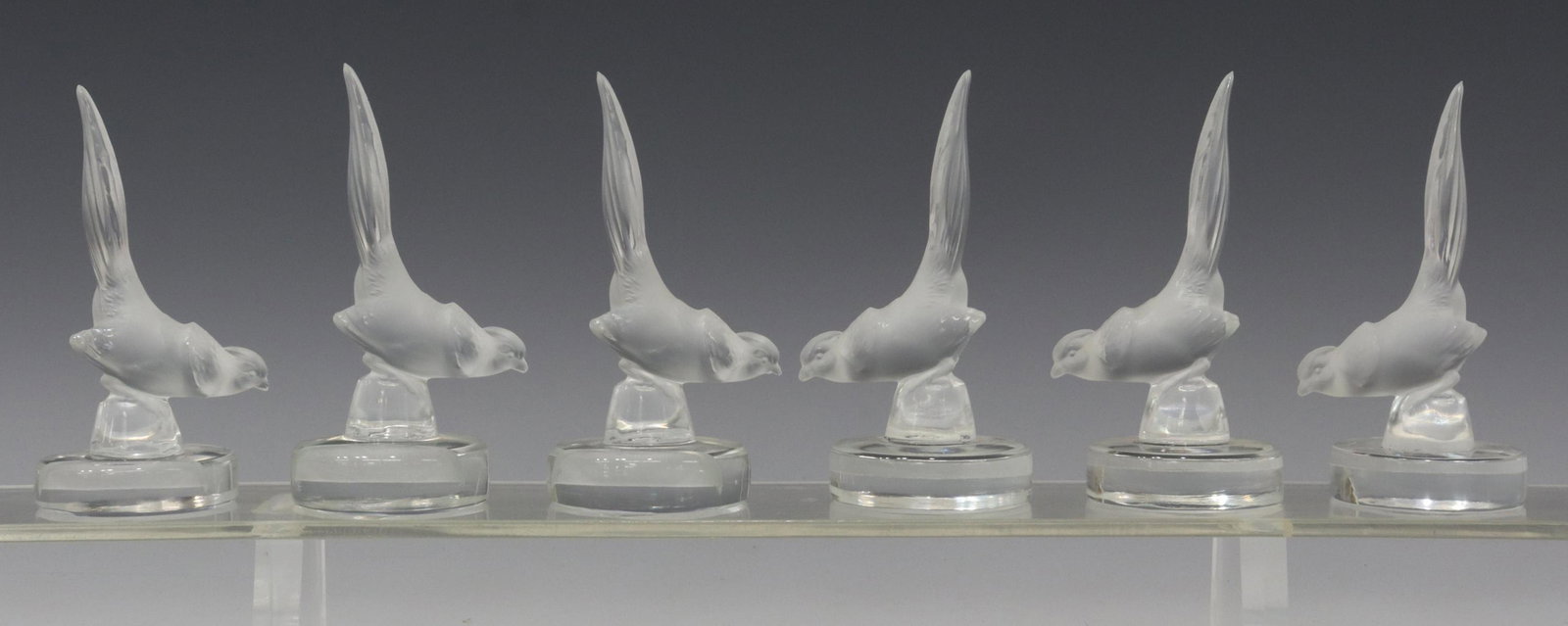 (6) LALIQUE 'FAISAN' FROSTED PLACE CARD HOLDERS: (lot of 6) French Lalique art crystal pheasant form place card holders, with engraved signatures underfoot, approx 4.5"h, 2"diam; 2lbs total **Provenance: a Houston, Texas estate** Start Price: $80.00
