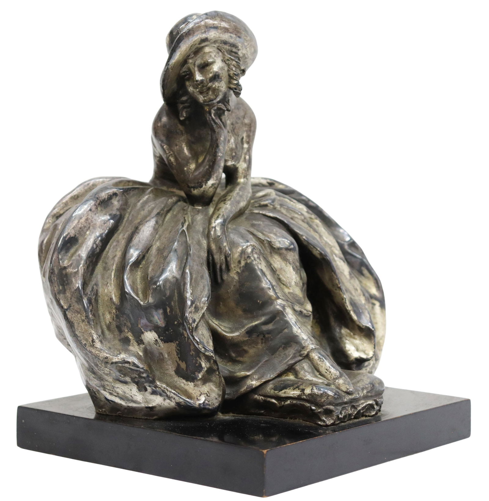 GUIDO CACCIAPUOTI (1892-1953) DECO SCULPTURE: Italian Art Deco cast ceramic sculpture, Guido Cacciapuoti (Italian, 1892-1953), seated female figure, in a metallic silver-tone glaze, on ebonized wood base, Gres d'Arte tag underfoot, overall: appro