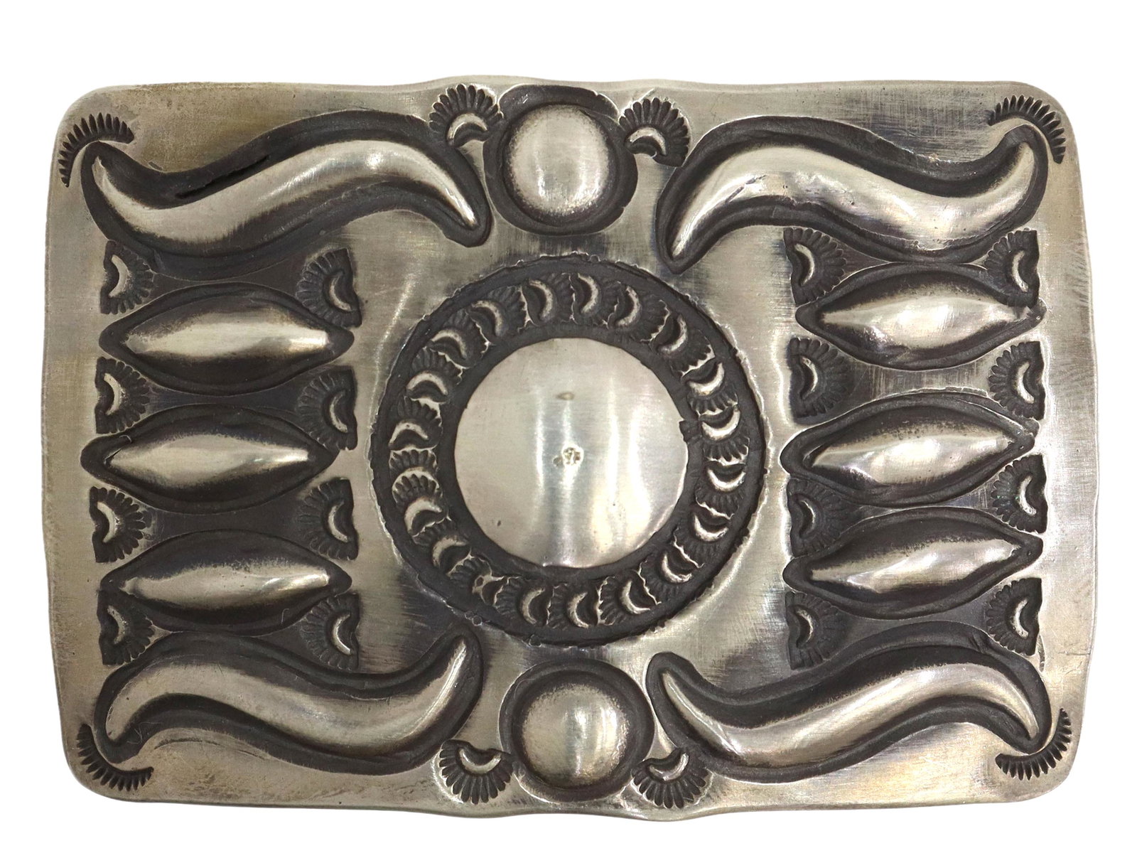 EMERSON BILL NAVAJO STERLING SILVER BELT BUCKLE: Native American sterling silver belt buckle, signed Emerson (Emerson Bill, Navajo, 20thc.), raised stylized design and stampwork, overall: approx 2 1/8"h, 3"w, holds belt size: approx 1.5"w, 56 grams 