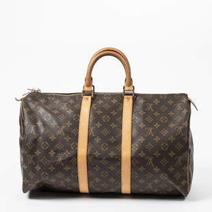 LOUIS VUITTON 'KEEPALL 45' MONOGRAM DUFFLE BAG: Louis Vuitton "Keepall 45" duffle bag, in brown monogram coated canvas, with brass hardware, tan Vachetta leather trim, dual rolled top handles, brown canvas interior lining, zip closure at top, patin