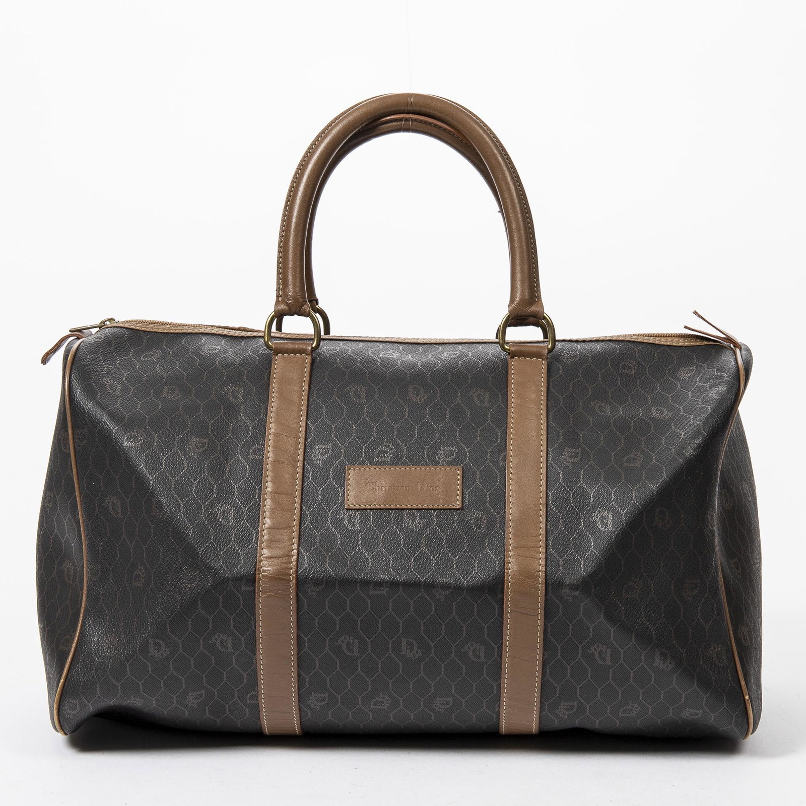 CHRISTIAN DIOR 'BOSTON 45' HONEYCOMB TRAVEL BAG: Christian Dior "Boston 45" travel bag, in black and brown honeycomb coated canvas, gold-tone hardware, brown leather trim, dual rolled top handles, single zipper closure at top, brown canvas lining, s