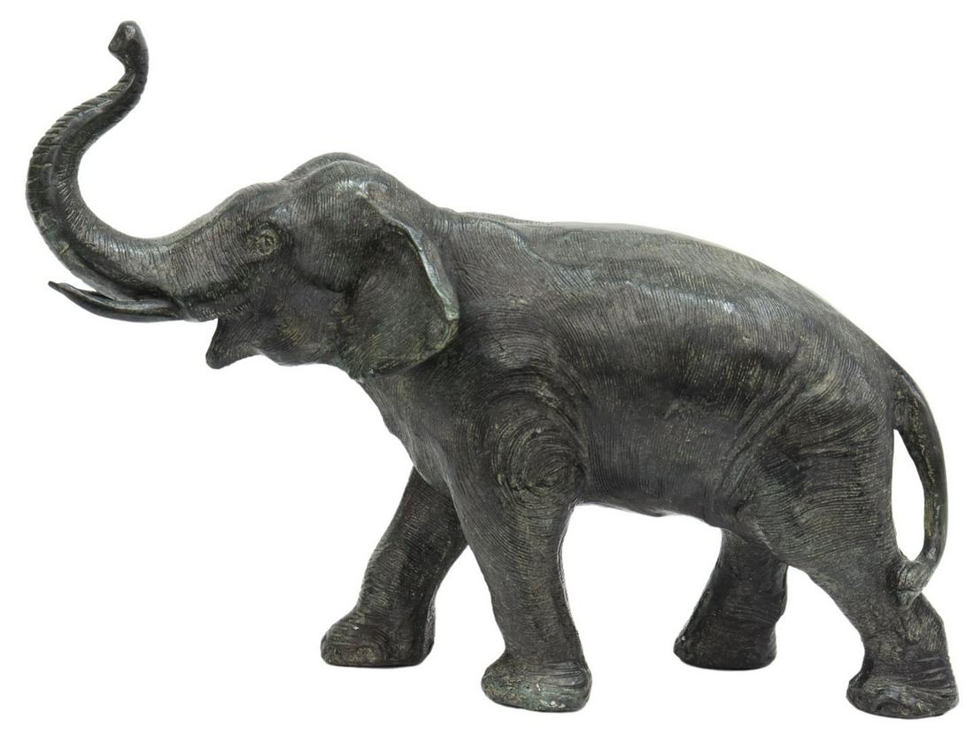 MAITLAND-SMITH (ATTRIB.) PATINATED BRONZE ELEPHANT: Patinated bronze elephant sculpture, attributed to Maitland-Smith, late 20th c., with raised tusk, in forward pose, approx 12"h, 17"w, 6"d, 16lbs **Provenance: From a prominent Dallas, Texas estate**