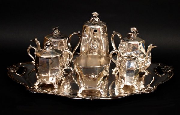 EXTENSIVE REED & BARTON COFFEE / TEA SERVICE: (lot of 7) Reed & Barton tea and coffee service, likely plated pewter, comprising (3) kettles, (1) sugar, (1) creamer and (1) waste pot, monogramed, modified floriform knop on each lid, paneled bodies