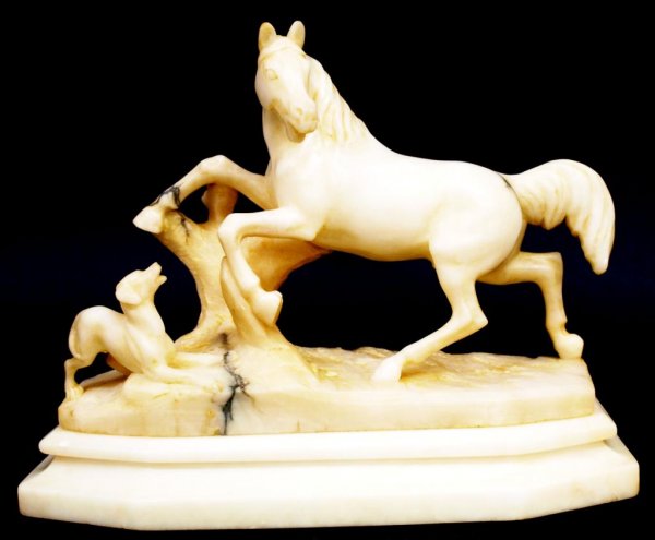 ITALIAN CARVED ALABASTER HORSE & DOG SCULPTURE: Italian carved alabaster statue, Horse and Dog, carved "Italy" under base, horse ear tip restored, 12"h, 14.5"l, 6"w, 14.5lbs total