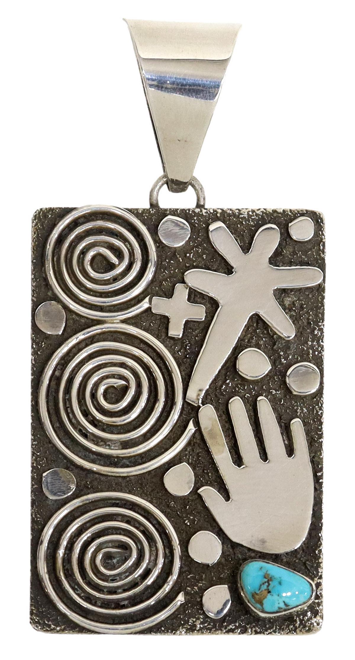ALEX SANCHEZ NAVAJO STERLING PETROGLYPH PENDANT: Native American sterling silver petroglyph pendant, signed Alex Sanchez (Navajo, b. 1969), dragonfly, hand of man and spiral design, small bezel set turquoise stone to the lower right, stampwork bears