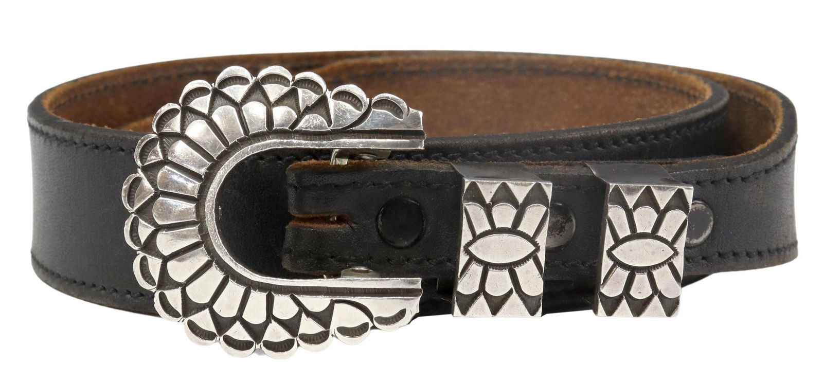 KENNETH BILL NAVAJO STERLING BELT BUCKLE SET: Native American sterling silver belt buckle set with leather belt, the buckle signed Kenneth Bill, Navajo, includes buckle, two loops and belt tip, leather belt: approx 34"l Start Price: $100.00