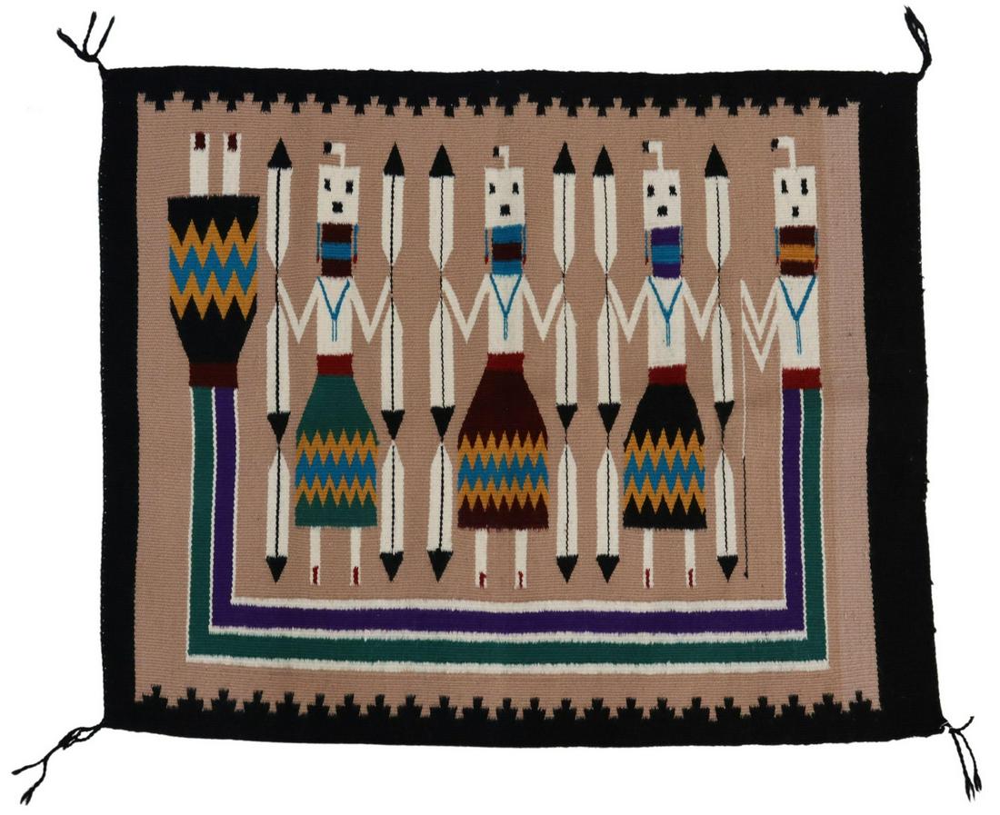 STELLA TSOSIE NAVAJO YEI FIGURES RUG, 3'2" X 2'8": Native American hand-woven wool rug, Stella B. Tsosie (Navajo/ Dine, Crownpoint, New Mexico, 20th c.), Yei figures with Rainbow God, accompanied by photograph of the artist, approx 3'2"l, 2'8"w, 2.25l
