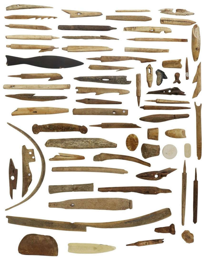 ST. LAWRENCE ISLAND ANCIENT TOOLS, WORKED ITEMS: (lot) Antique and fossilized tools, bone, wood and sea life parts gathered at St. Lawrence Island, Alaska (closer to Russia), an area thought to be a part of the ancient land bridge between Asia and N