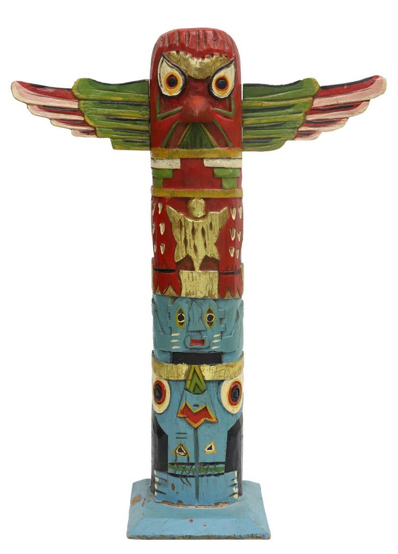 LARGE PARCEL GILT & PAINTED CARVED WOOD TOTEM POLE: Carved parcel gilt and polychrome painted wood totem pole, 20th c., depicting three anthropomorphic and animal figures, rising on a tapered square base, approx 20"h, 15"w, 6"d, 1.5lbs Start Price: $80