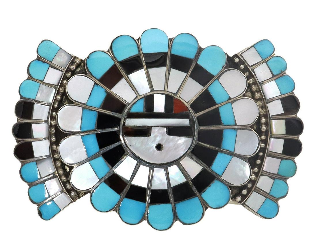J.D. MASSIE ZUNI STERLING SUN FACE BELT BUCKLE: Native American silver (content unknown) belt buckle, signed J. D. Massie (Jose and Dora Massie, Zuni, 20thc.), sun face inlaid with turquoise, jet and mother-of-pearl shell, overall: approx 2.75"l, 2