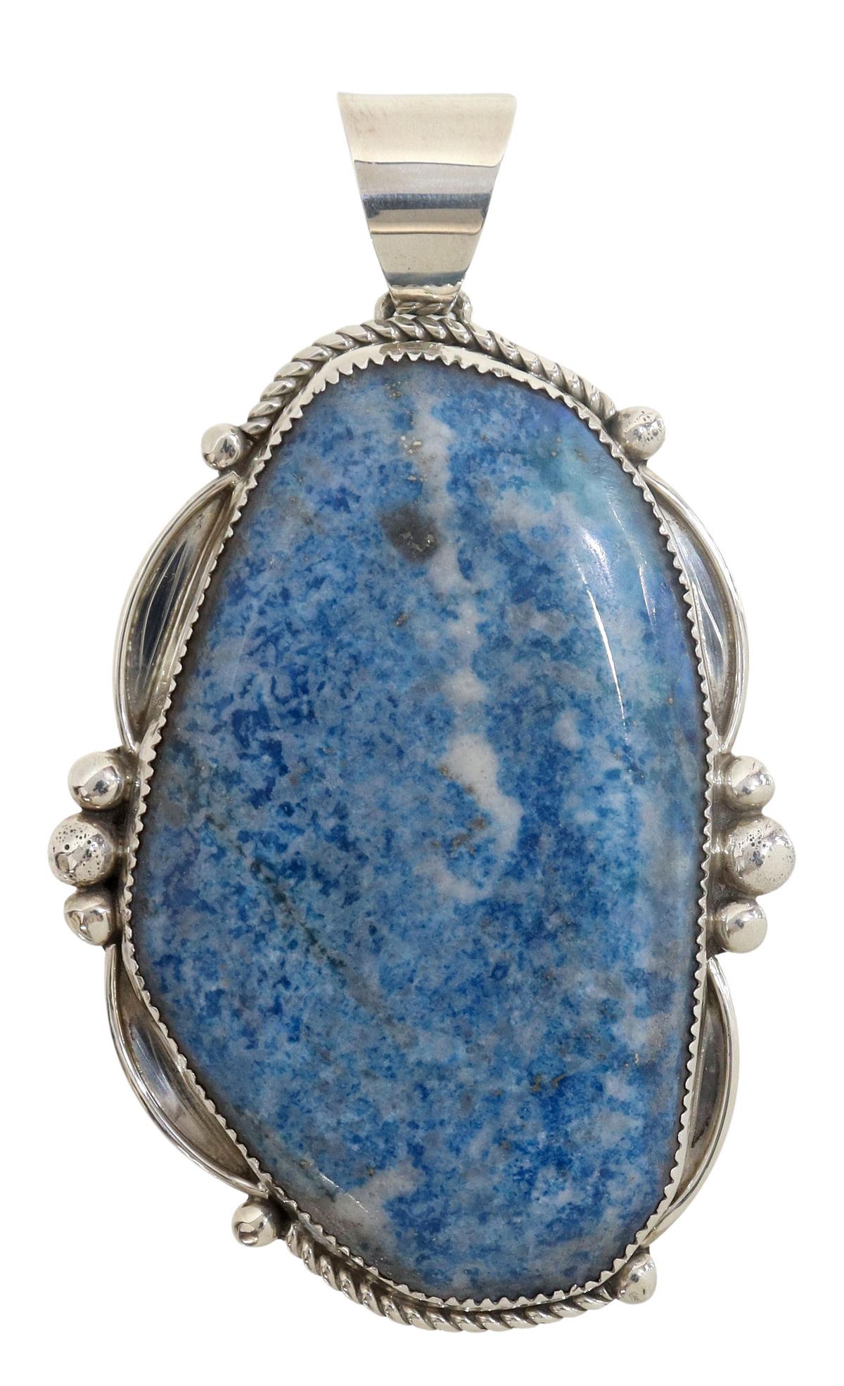 LARGE SOUTHWEST SILVER & BLUE STONE PENDANT: Large Southwest silver (content unknown) pendant, oval form with twist and bead surround, enclosing a free form bezel set blue stone, possibly sodalite, unsigned, overall: approx 3.25"h, 2"w, pendant:
