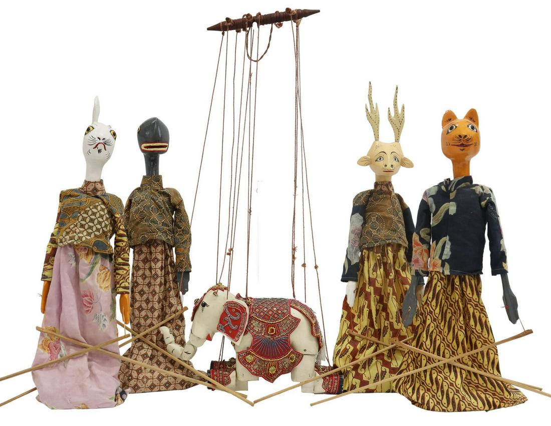 (5) VINTAGE CARVED BALINESE ANIMAL STICK PUPPETS: (lot of 5) Collection of hand-carved Balinese stick puppets, each representing a different animal, attired in native dress, arms with stick extensions, standing on a base, rabbit lacking one ear, toge