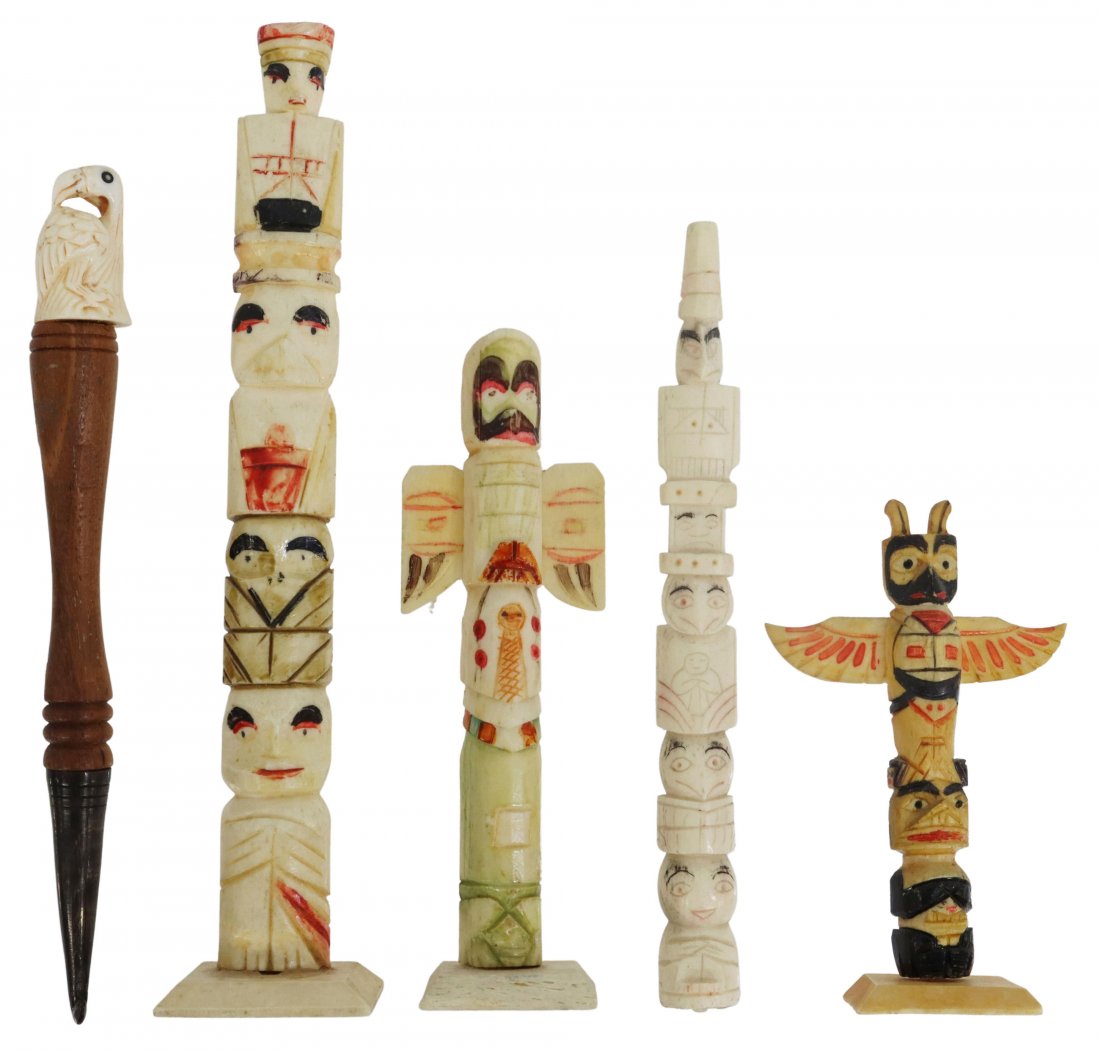 (5) NORTHWEST COAST NATIVE AMERICAN TOTEM POLES: lot of 5) Pacific Northwest Coast carved walrus items, comprising: (4) polychrome painted totem poles, (one) stamped Seattle to back, (one) lacking base; (1) turned wood crochet hook with pierce carve
