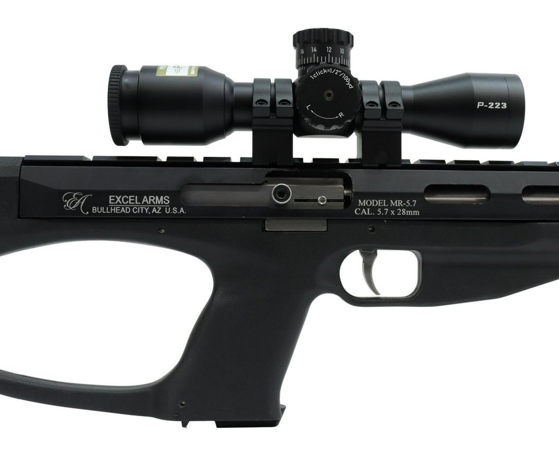 EXCEL ARMS 5.7CALIBER SEMI AUTO RIFLE, NIKON SCOPE: Excel Arms Model MR-5.7 Accelerator semi-automatic Carbine, 5.7 x 28mm caliber, 18" fluted stainless steel barrel, nine round detachable round magazine, black composite stock, mounted Nikon P-223 scop