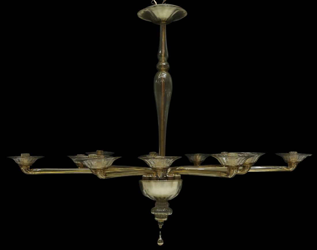 MURANO ART GLASS TWELVE-LIGHT CHANDELIER: Italian modern art glass chandelier, mid 20th c., glass-clad standard, twelve glass arms ending in dish bobeche and socket, central bowl and finial drop, (one) glass socket with restoration, in need o
