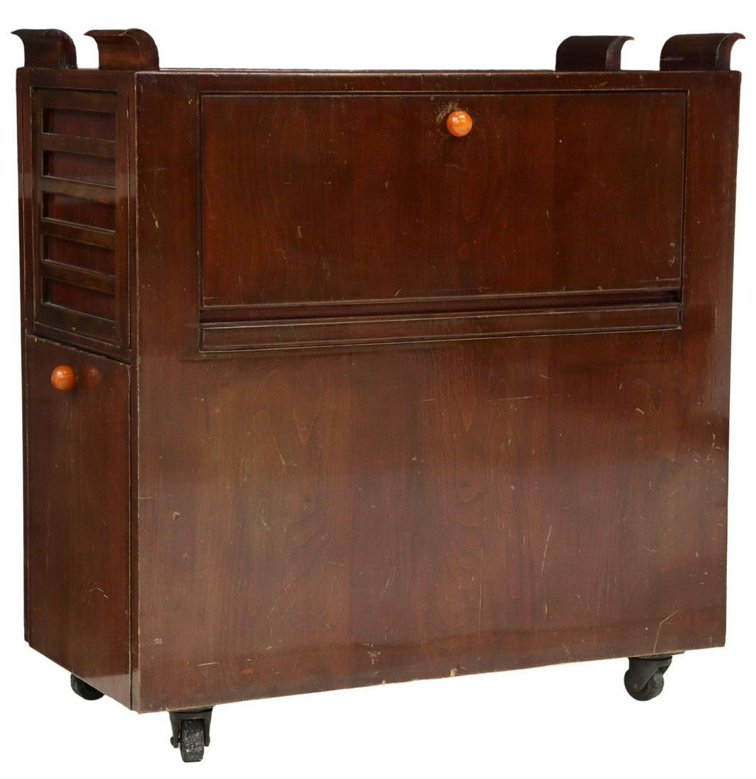 FRENCH ART DECO MAHOGANY BAR CART CABINET: French Art Deco bar cart cabinet, c.1920s, having rectangular mahogany case, fitted with curved handles, two drawers, three fall front cabinet doors, opening to storage, accented with contrasting ball
