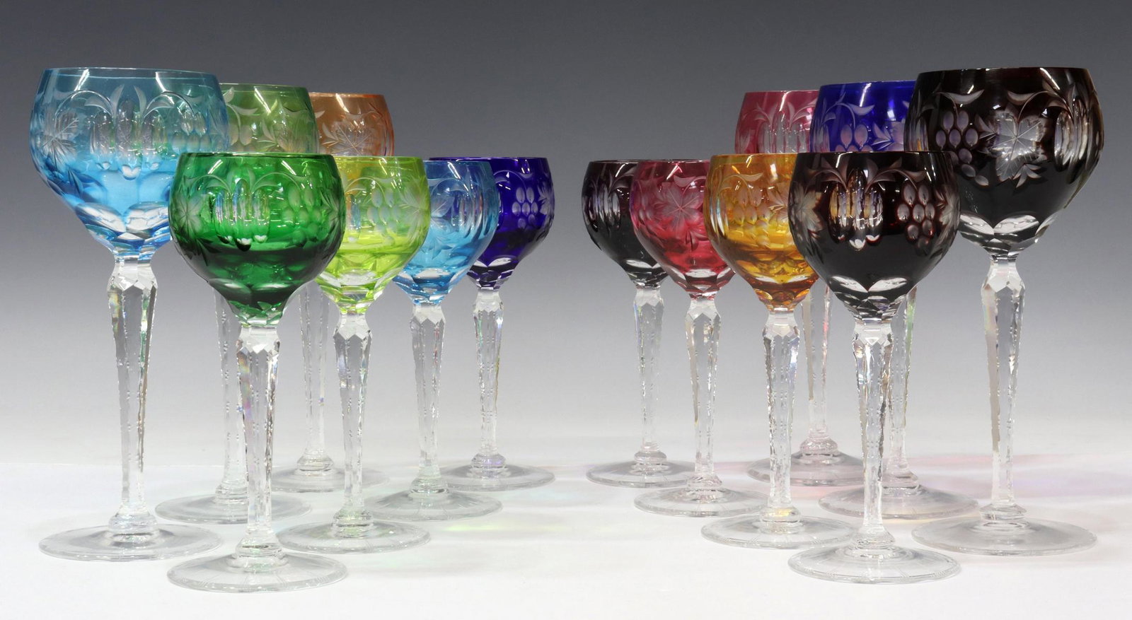 (14) BOHEMIAN CUT-TO-CLEAR CRYSTAL STEMWARE: (lot of 14) Bohemian cut-to-clear crystal stemware, bowl cut with grape clusters and leaves, tapered notched stem, on a circular foot with cut border, including: (6) goblets, approx 8.25"h, 3.5"diam, 